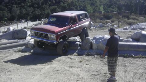1978 Ford Bronco - This 1978 Ford Bronco is shown navigating a challenging off-road obstacle course.