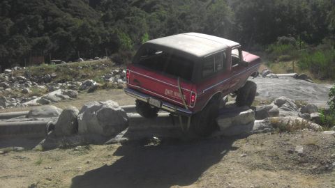 1978 Ford Bronco - This 1978 Ford Bronco is shown off-roading on a rocky terrain.