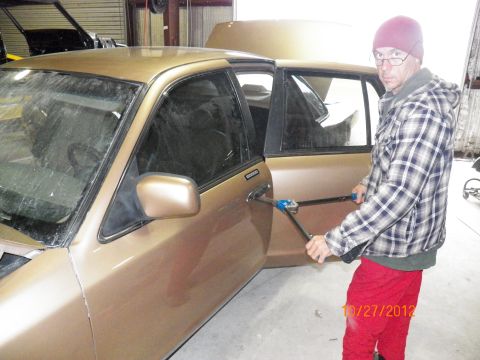 1993 Ford Crown Victoria - Mike waiting for me to hold the rivet gun while installing the door handles. NOTE: If using a manual rivet tool and you are close to a fres…