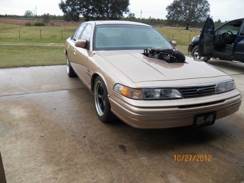 1993 Ford Crown Victoria - Notice the reflection of the concrete in the paint. That is what 4-6 hours of wet sanding can do to an already well painted vehicle. Mike d…