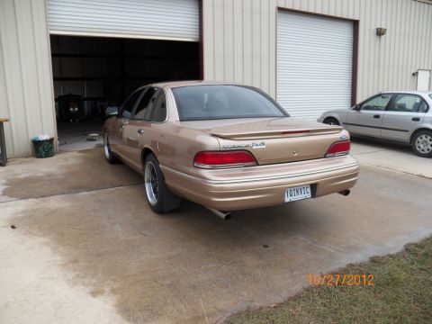 1993 Ford Crown Victoria - We found an issue with the piece that goes b/t the tail lights. The red plastic began to separate from the 'chrome' portion and caused dark…
