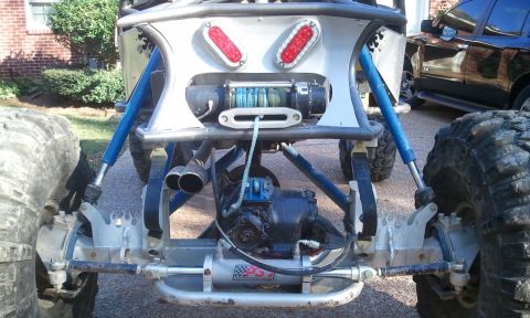 1967 Ford Mustang - This buggy's rear suspension and axle assembly are visible, with a winch mounted above the differential.