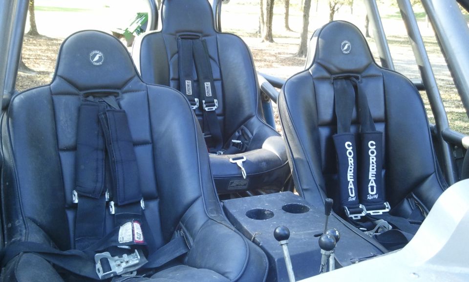 Buggy interior with three Corbeau racing seats and harnesses