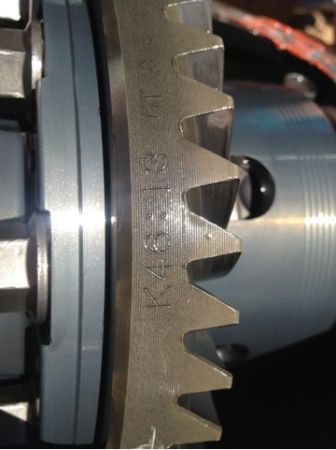 1996 Ford Bronco - Close-up of a differential gear with visible part numbers and gear ratio.