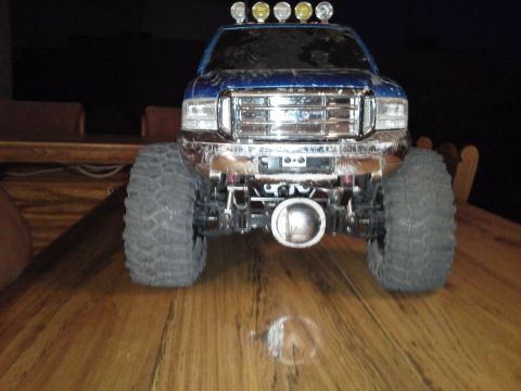 1985 Ford Bronco - This remote-controlled truck features oversized tires and a detailed front grille.