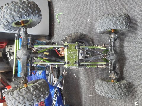 1985 Ford Bronco - The underside of a modified remote control rock crawler shows its complex suspension and drivetrain.