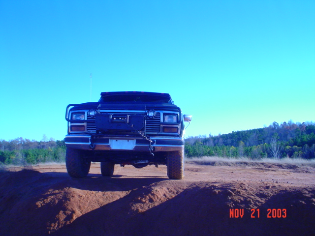 1986 Ford Bronco front view on dirt track