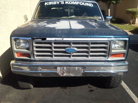 1985 Ford Bronco - This 1985 Ford Bronco is seen from the front, its distinctive grille and chrome bumper.