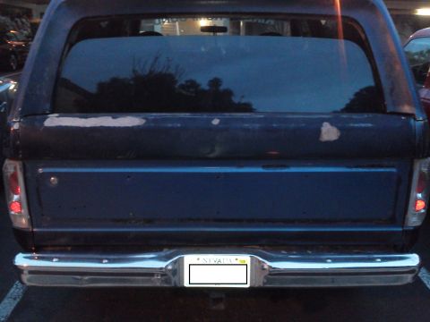 1985 Ford Bronco - Rear view of a 1985 Ford Bronco, showing the tailgate and bumper.