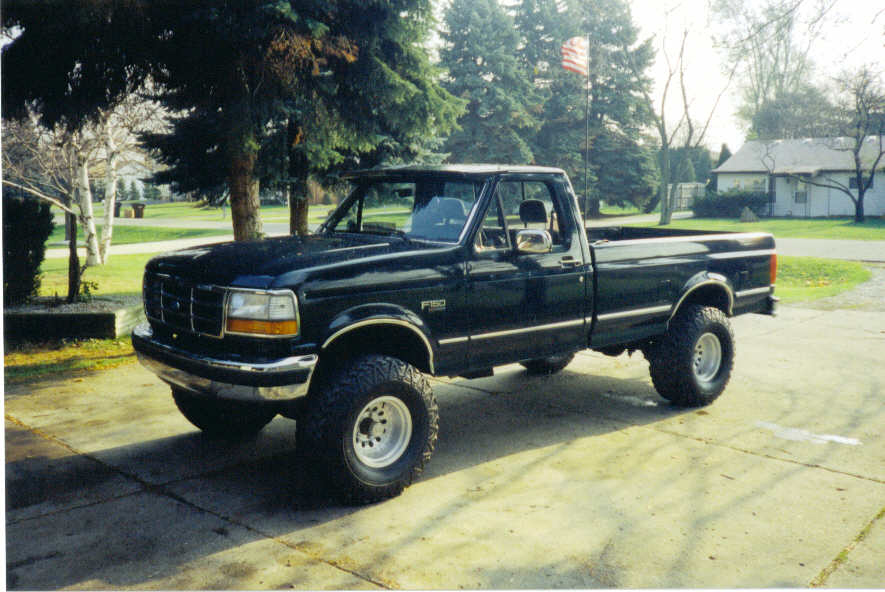 Black pickup truck, 3q front view, 1995 model year