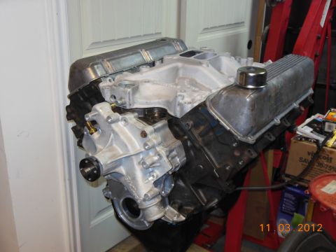 1979 Ford F-150 - A V8 engine is shown on an engine stand, ready for installation or work.