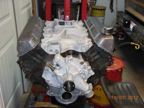 1979 Ford F-150 - Engine assembly on a stand, with a pickup truck visible in the background. Date stamp reads 11 03 2012.