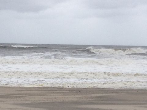 1990 Ford Bronco - Ocean waves during a storm, with a watermark for SUPERMOTORS visible.