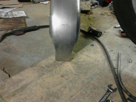 2003 Harley-Davidson Sportster - Metal part on floor with welding equipment, not a 2003 Harley-Davidson Sportster.