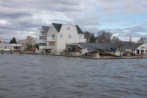 1990 Ford Bronco - Waterfront homes show significant damage to roofs and structures following Hurricane Sandy.