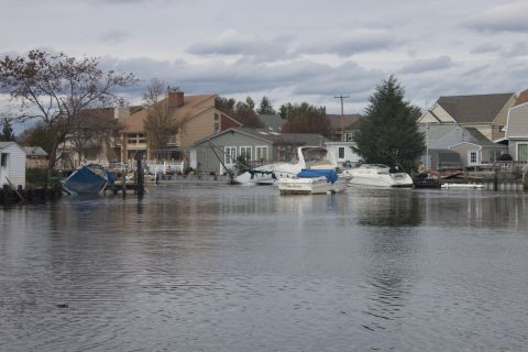 1990 Ford Bronco - Boats are seen on flooded streets in a residential area after Hurricane Sandy.