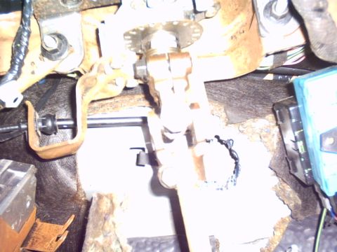 1991 Ford LTD Crown Victoria - Interior view of a vehicle's pedal assembly and steering column components.