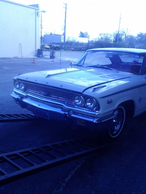 1960 Ford Falcon - Front quarter view of a white 1963 Ford Galaxie 500.