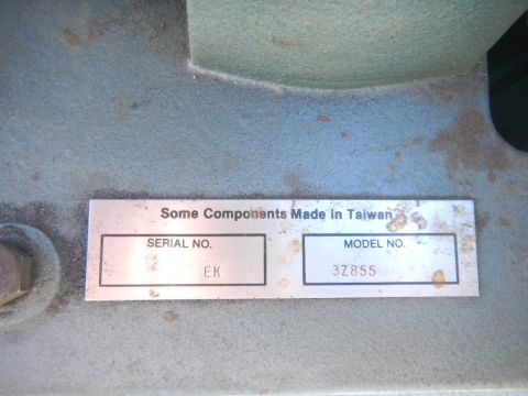 1997 Ford Ranger - A metal plate indicates that some components were made in Taiwan, with serial number EK and model number 3Z855.
