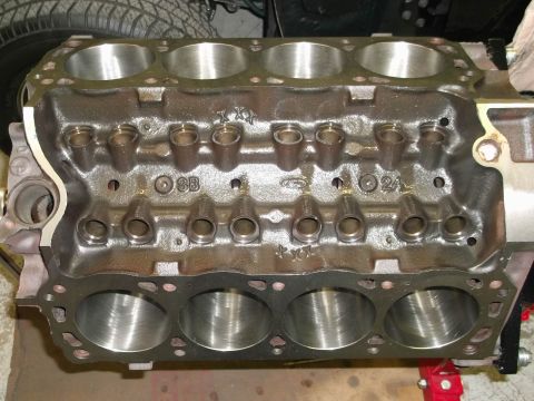 1987 Ford Mustang - Close-up view of an engine block, showing cylinder bores and casting marks.