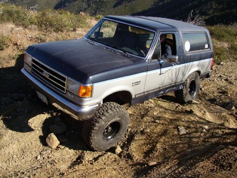 1989 Ford Bronco - This 1987 Ford Bronco navigates a challenging, uneven terrain.
