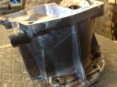 1966 Ford Bronco - This automotive part exhibits significant cracking, suggesting it may be damaged or worn out.