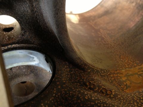 1987 Ford Ranger - This image shows a close-up view of a heavily corroded engine component, with the Supermotors.net watermark visible in the lower right corn…