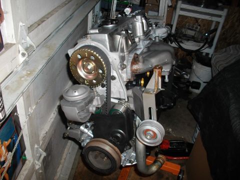 1989 Ford Probe - Engine assembly shown with timing belt and various pulleys.
