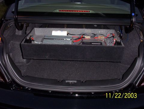 2003 Ford Taurus - Custom audio system installed in the trunk of a car, dated 11/22/2003.