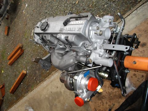 1989 Ford Probe - Engine assembly with turbocharger and 16-valve head visible.