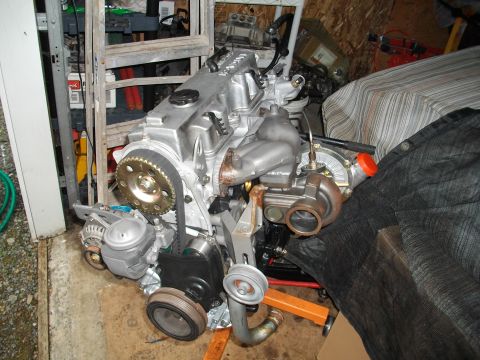1989 Ford Probe - This is a turbocharged engine, likely out of a vehicle, with various components attached.