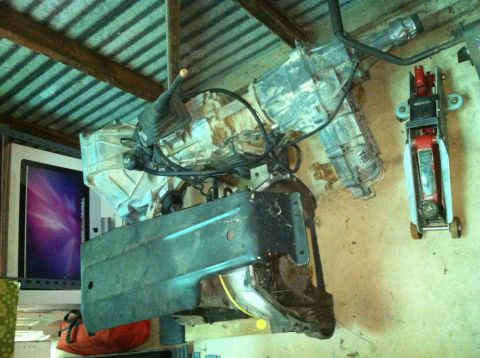 1986 Ford Bronco - This photo shows a vehicle transmission and other parts, not a complete vehicle.