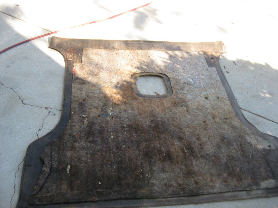 Rear cargo area carpet padding.