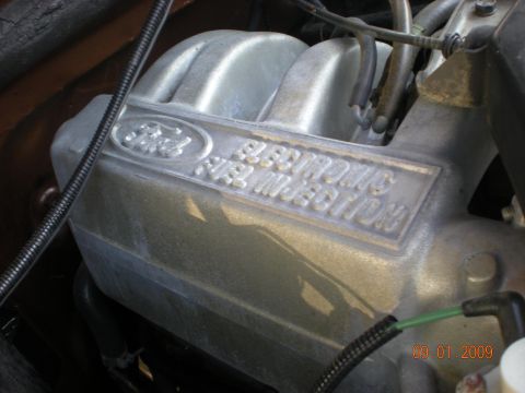 1986 Ford Bronco - A Ford intake manifold with 'ELECTRONIC FUEL INJECTION' text is visible.