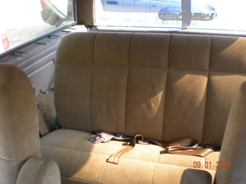 1986 Ford Bronco - The interior of a vehicle shows the back seat and seatbelts, with a date watermark from 2009.