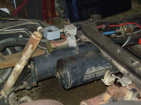 1983 Ford Bronco - I decided not to build a bracket, and simply welded some studs to the tank to mount the primary compressor. I may put the second on the oth…