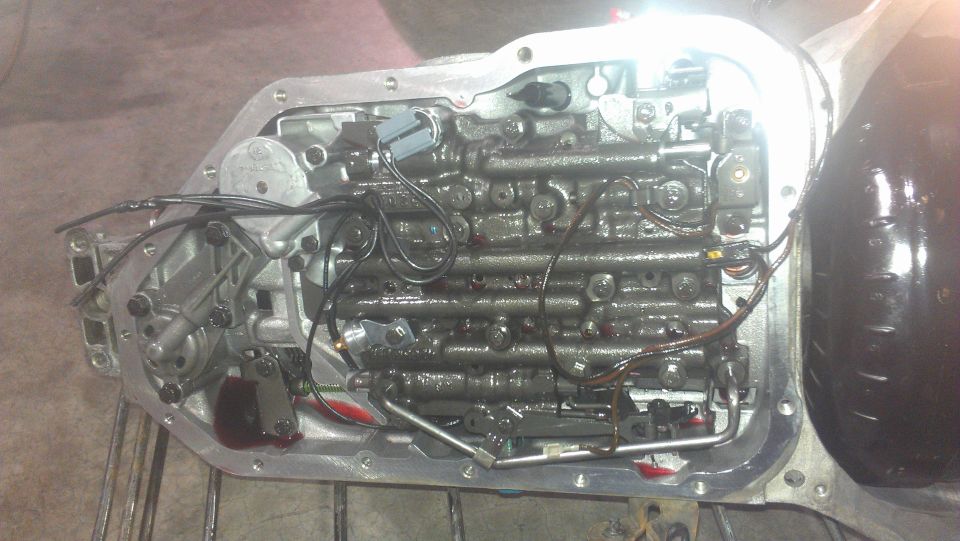 Automatic transmission valve body with visible solenoids and wiring