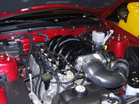 2007 Ford Mustang - Close-up of engine bay components, including a Ford Racing intake manifold.