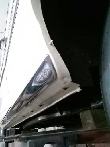1960 Ford Falcon - Undercarriage view of a vehicle, highlighting the rocker panel and some structural components.