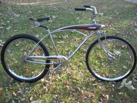 1994 Ford Bronco - Custom cruiser bicycle with chrome frame and wood-grain tank sits on a grassy lawn.