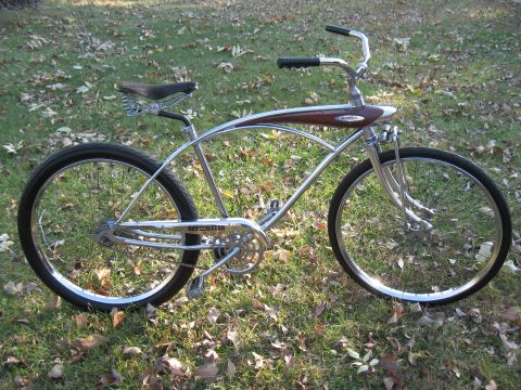 1994 Ford Bronco - This cruiser bicycle has a chrome frame and a brown painted tank with chrome trim.