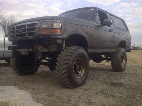 1995 Ford Bronco - This modified Ford Bronco sits high on large off-road tires, ready for rough terrain.
