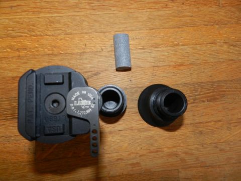 1996 Ford Bronco - Several automotive parts are laid out on a wooden surface, including a housing with patent pending information.