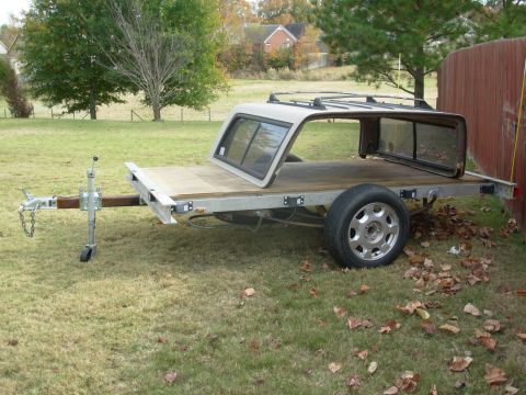 2004 Land Rover Land Rover - I finally found some junkyard lift struts that would fit & work to hold the deck tilted, and installed them.