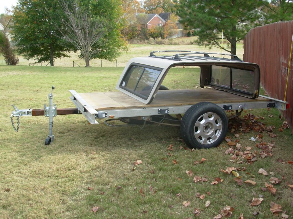 I finally found some junkyard lift struts that would fit & work to hold the deck tilted, and installed them.