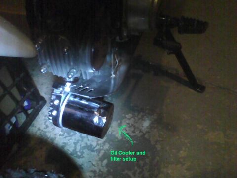 2003 Ford Crown Victoria - This image shows an oil cooler and filter setup, not a 2003 Ford Crown Victoria.