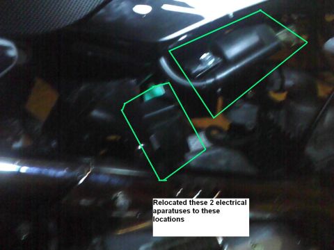 2003 Ford Crown Victoria - Electrical components relocated within the engine bay.