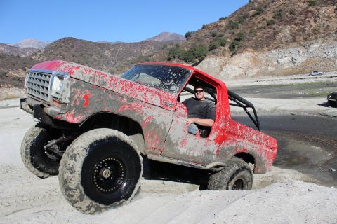 1978 Ford Bronco - This red 1978 Ford Bronco is covered in mud after an off-road excursion, its capabilities.
