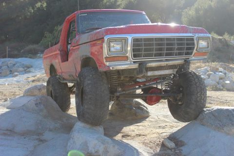 1978 Ford Bronco - Modified 1978 Ford Bronco navigating a rocky obstacle course.