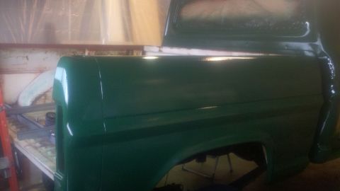 1967 Ford F-250 - The rear bed of a 1967 Ford F-250 pickup truck, freshly painted green.